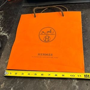 Hermes square orange paper bag. Great condition.